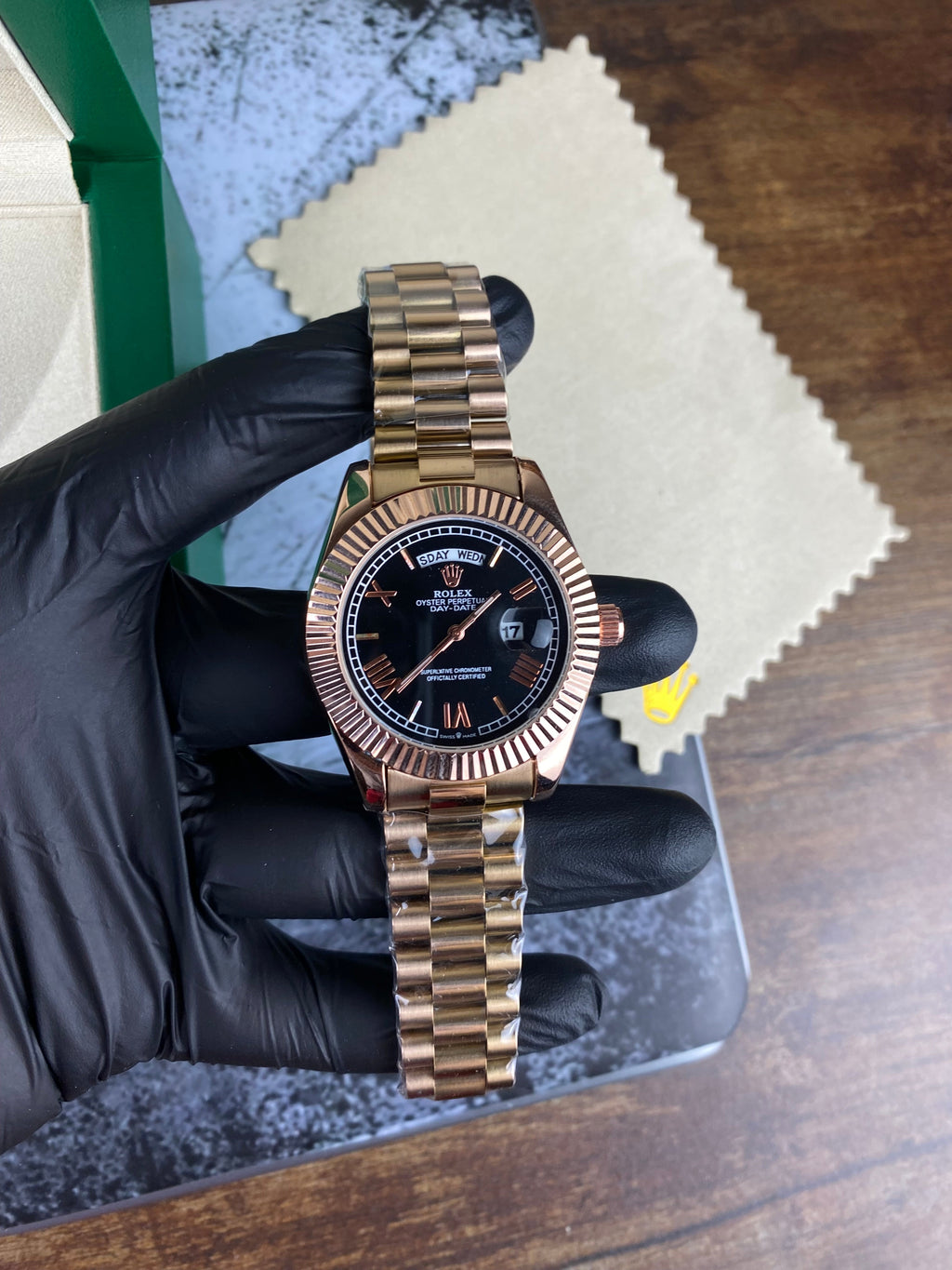 Rolex Day-Date 40 Everose gold with black dial